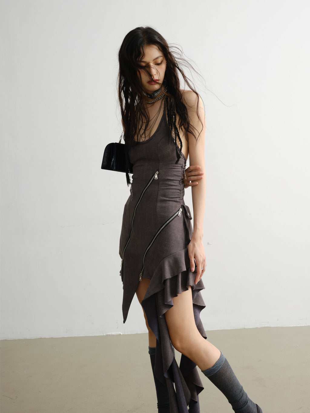 ASYMMETRICAL MINI DRESS WITH ZIPPER DETAILS FOR A BOLD STATEMENT