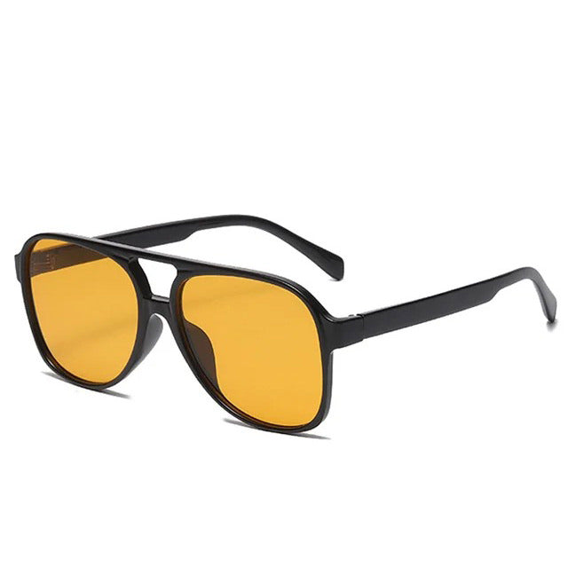 AVIATOR SUNGLASSES WITH BLACK FRAMES AND YELLOW LENSES