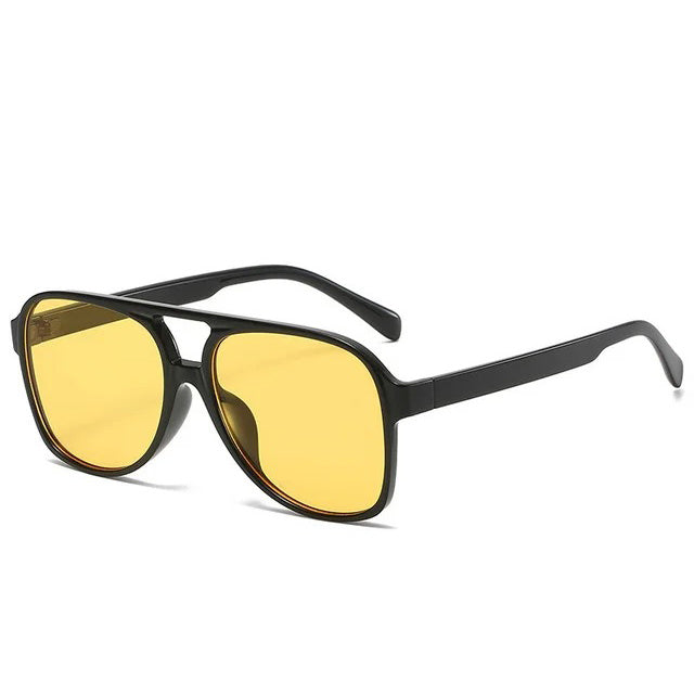 AVIATOR SUNGLASSES WITH BLACK FRAMES AND YELLOW LENSES