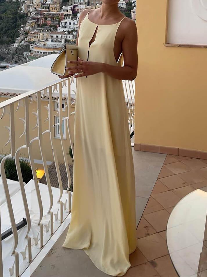 BACKLESS YELLOW SLIP DRESS WITH CREW NECK DESIGN