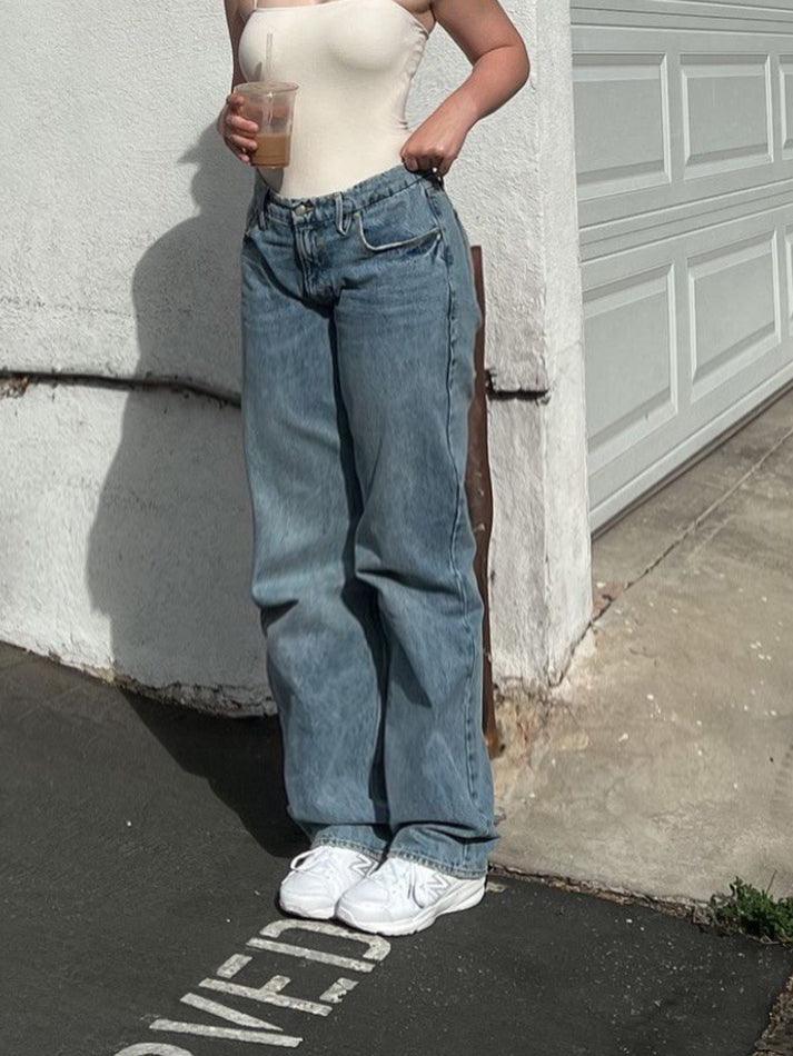 BAGGY BLUE JEANS WITH VINTAGE WASH AND FUNCTIONAL POCKETS