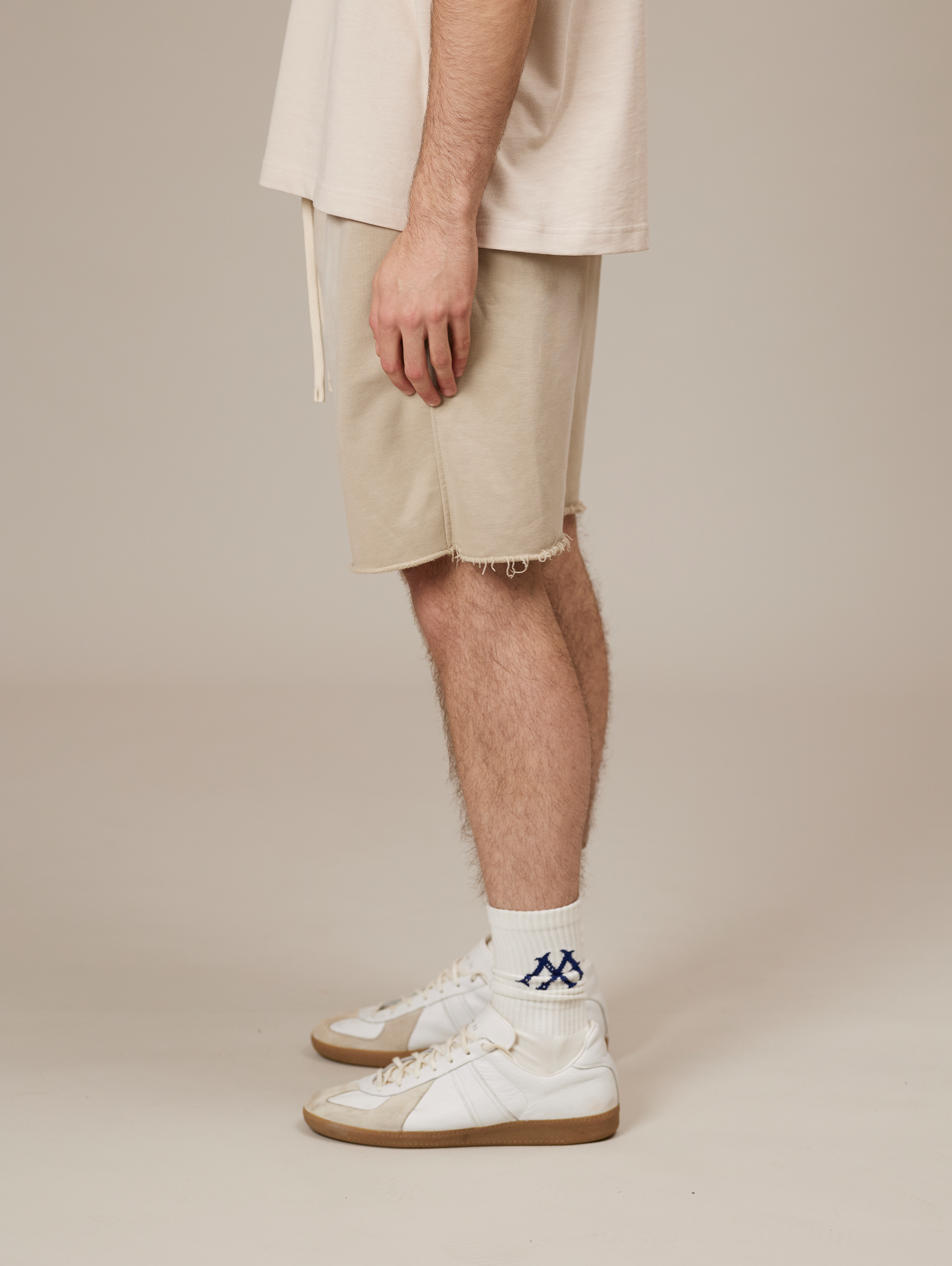 BEIGE DRAWSTRING SHORTS WITH COTTON SUNFADED SPRAY FINISH