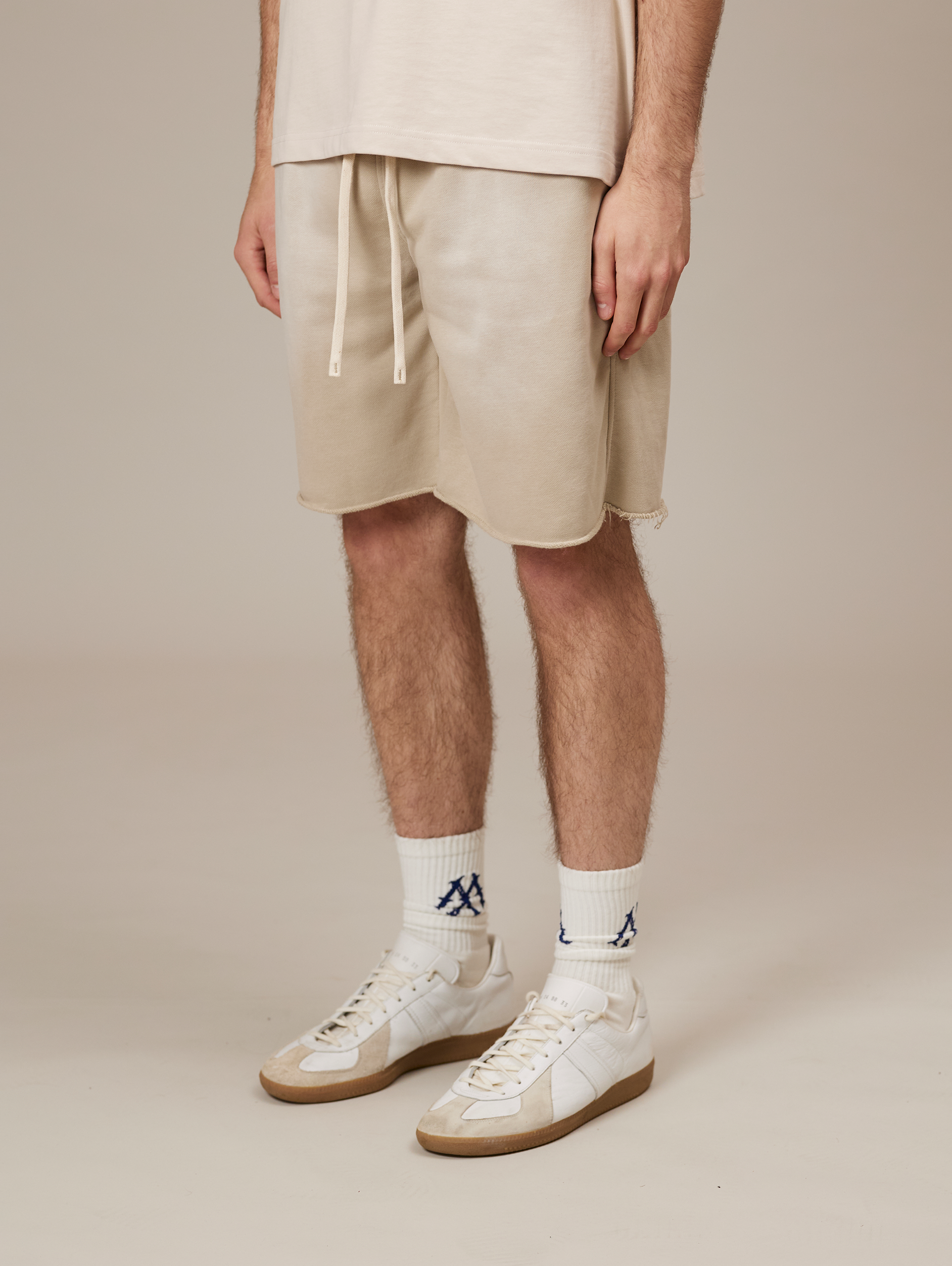 BEIGE DRAWSTRING SHORTS WITH COTTON SUNFADED SPRAY FINISH