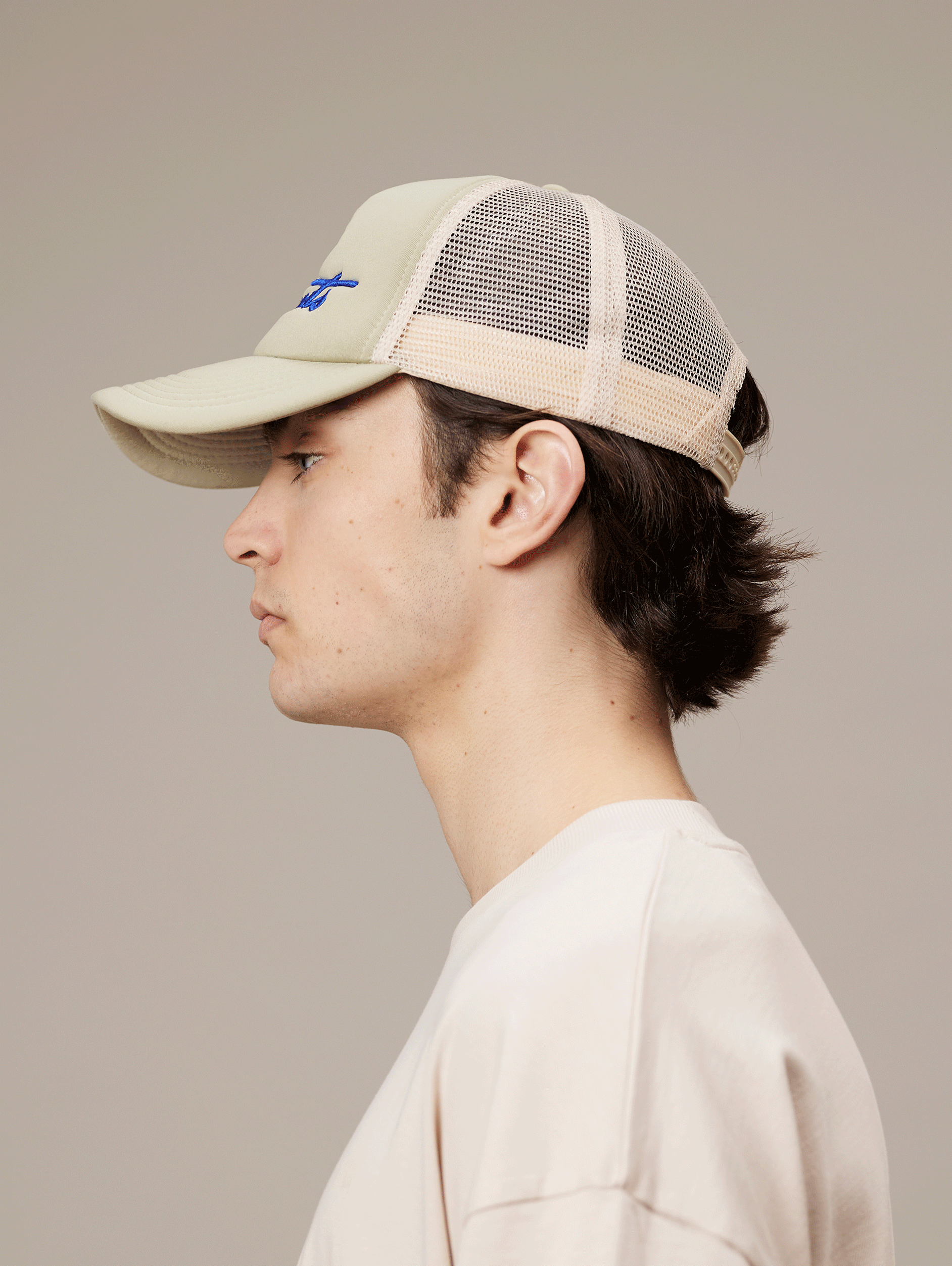 BEIGE FOAM CAP WITH SUN GRAPHIC AND SNAP CLOSURE