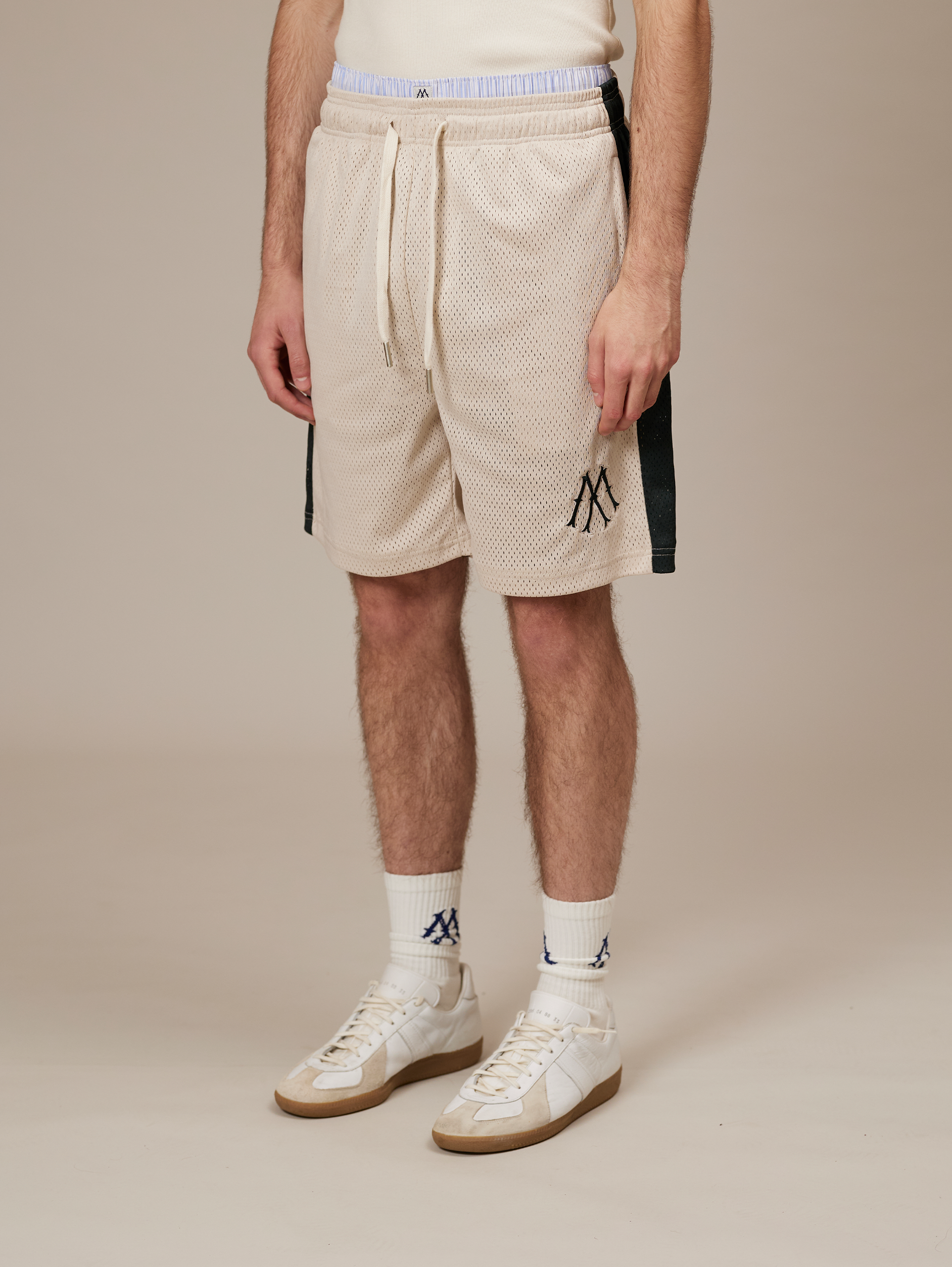 BEIGE MESH SHORTS WITH DARK GREEN STRIPE