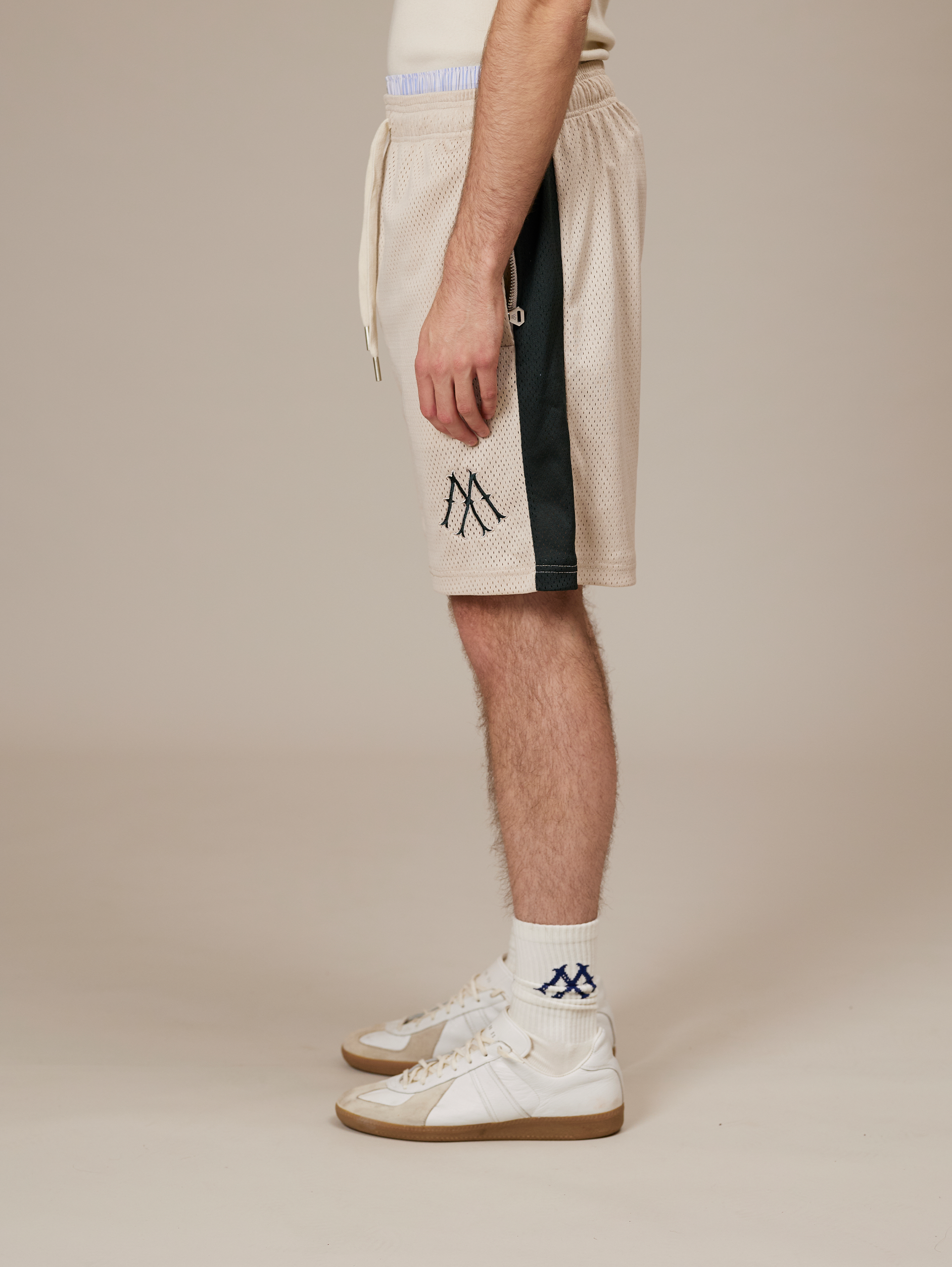 BEIGE MESH SHORTS WITH DARK GREEN STRIPE