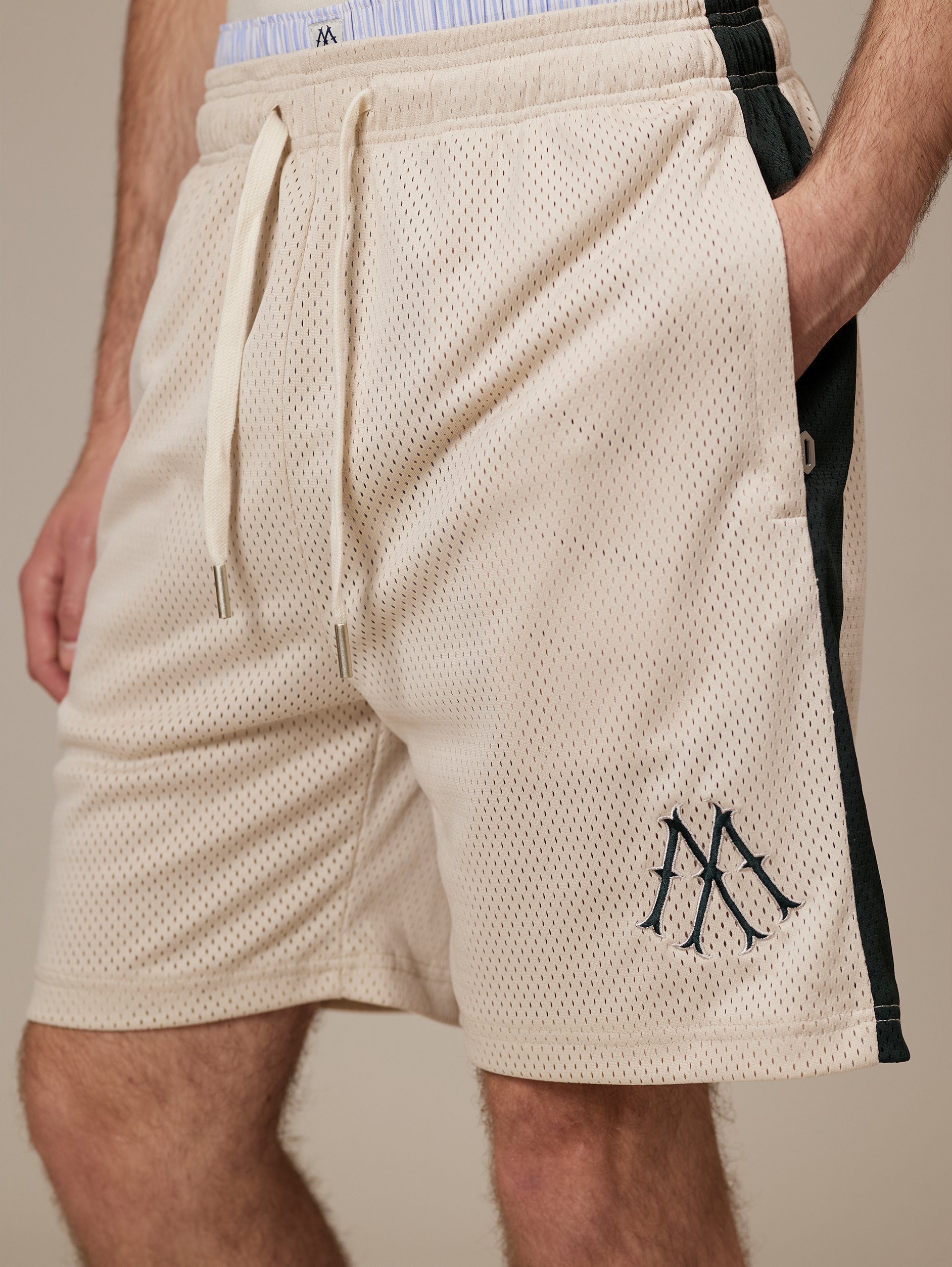 BEIGE MESH SHORTS WITH DARK GREEN STRIPE