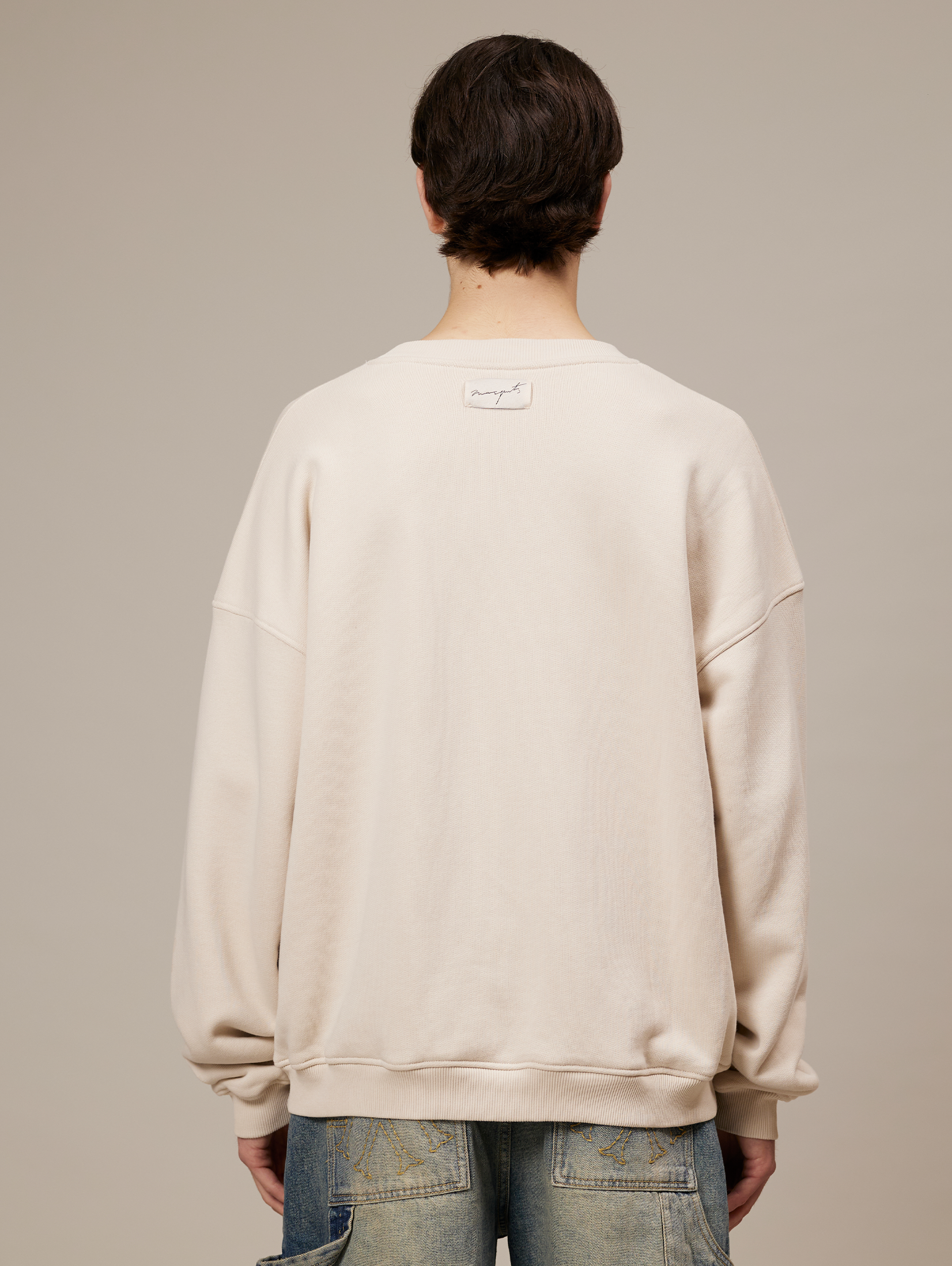 BEIGE OVERSIZED DROPPED COTTON LOOPBACK SWEATSHIRT WITH ORANGE GRAPHIC
