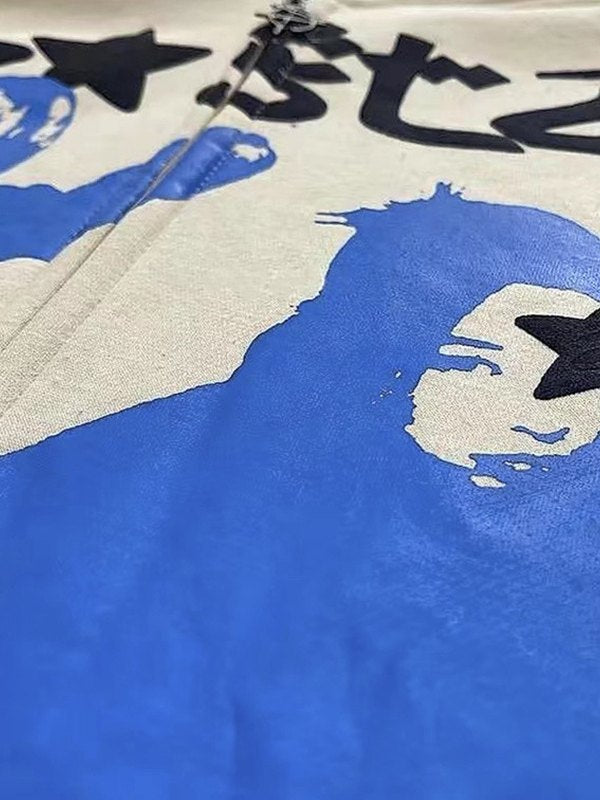 BEIGE ZIP-UP HOODIE WITH BLUE GRAPHIC LOOSE FIT CREW DESIGN