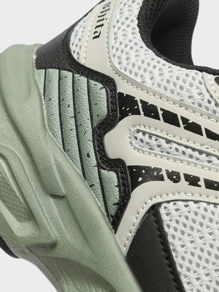 BLACK AND WHITE ATHLETIC SHOE FOOTWEAR