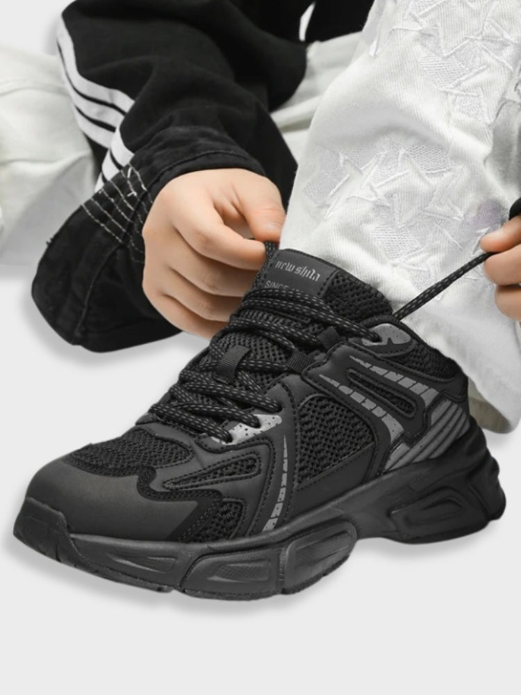 BLACK AND WHITE ATHLETIC SHOE FOOTWEAR