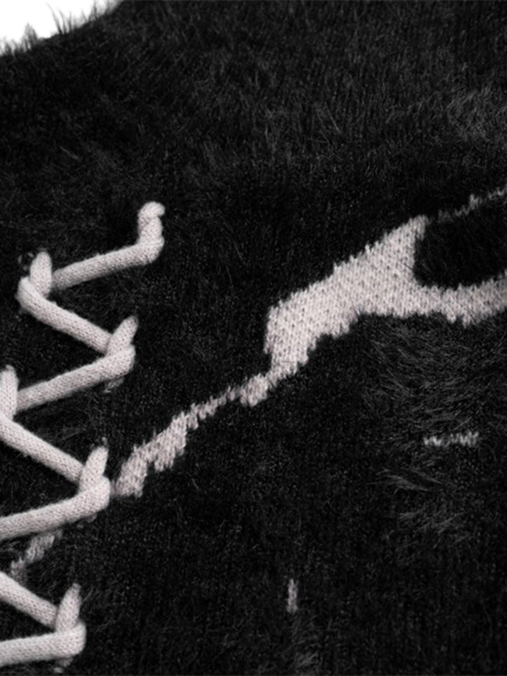 BLACK AND WHITE DISTRESSED KNIT SWEATER WITH LACE-UP DETAIL LONG SLEEVE