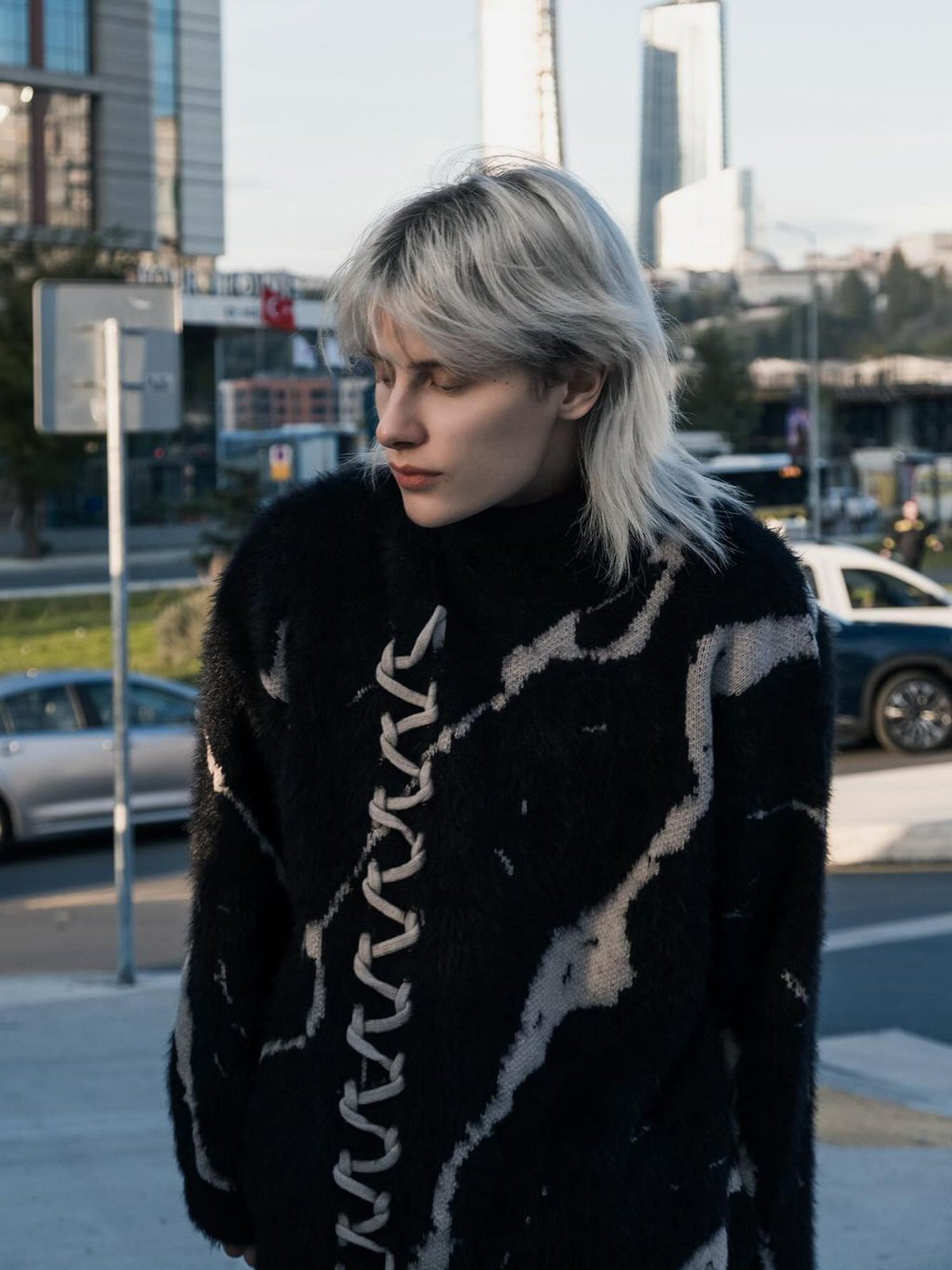 BLACK AND WHITE DISTRESSED KNIT SWEATER WITH LACE-UP DETAIL LONG SLEEVE