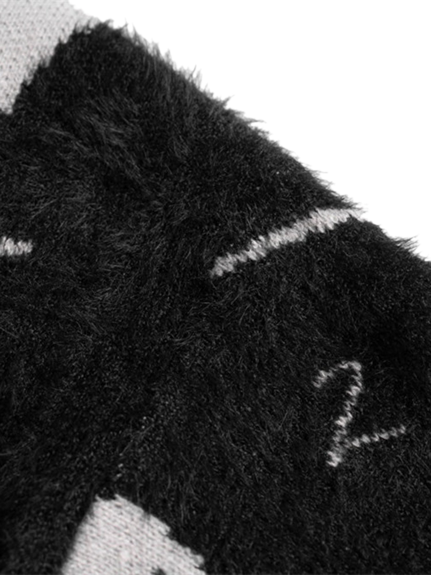 BLACK AND WHITE DISTRESSED KNIT SWEATER WITH LACE-UP DETAIL LONG SLEEVE