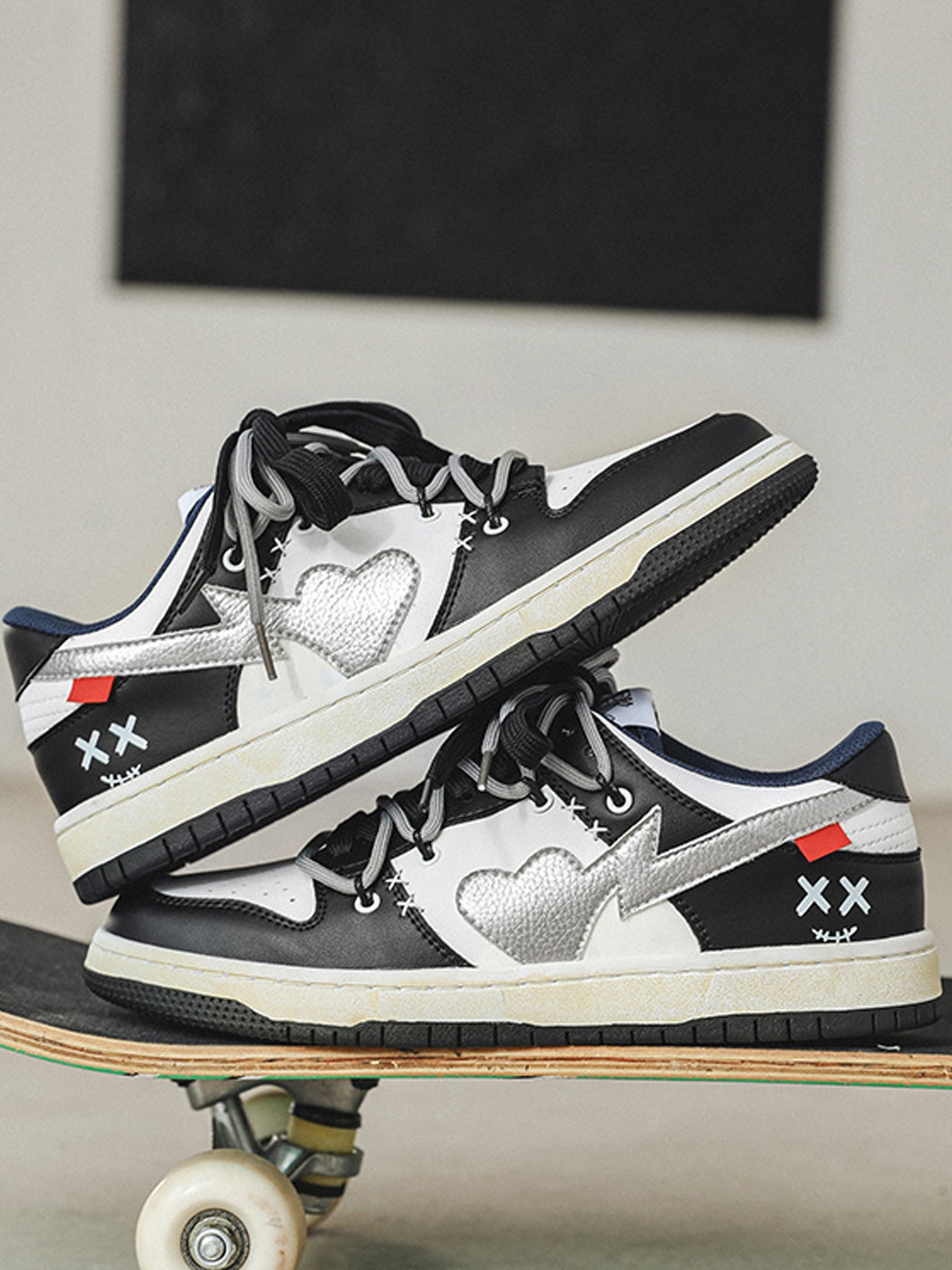 BLACK AND WHITE SNEAKERS WITH HEART DETAIL STREET LOVE PATCHWORK