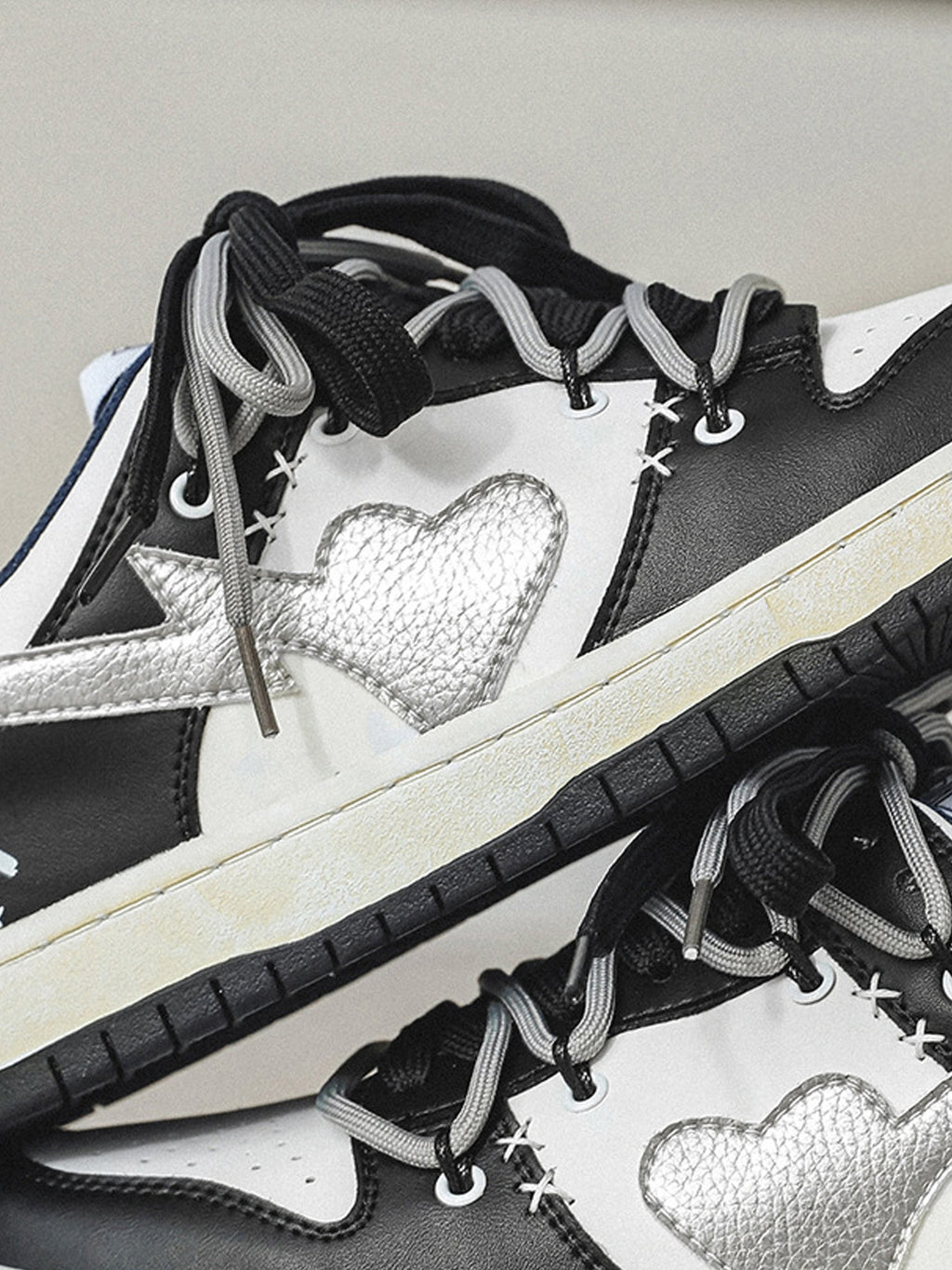 BLACK AND WHITE SNEAKERS WITH HEART DETAIL STREET LOVE PATCHWORK