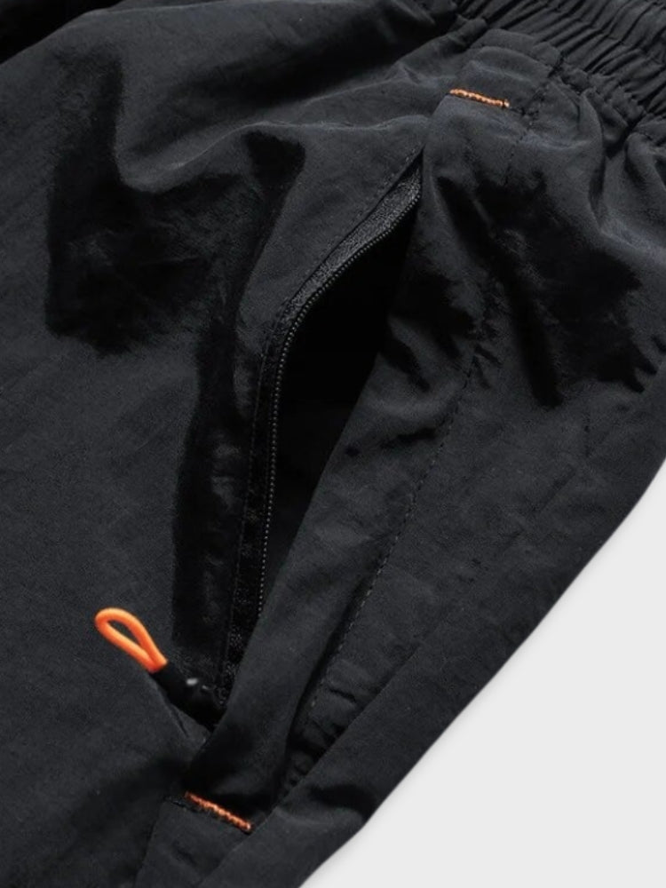 BLACK ATHLETIC SHORTS WITH ORANGE DRAWSTRING FOR ACTIVE WEAR