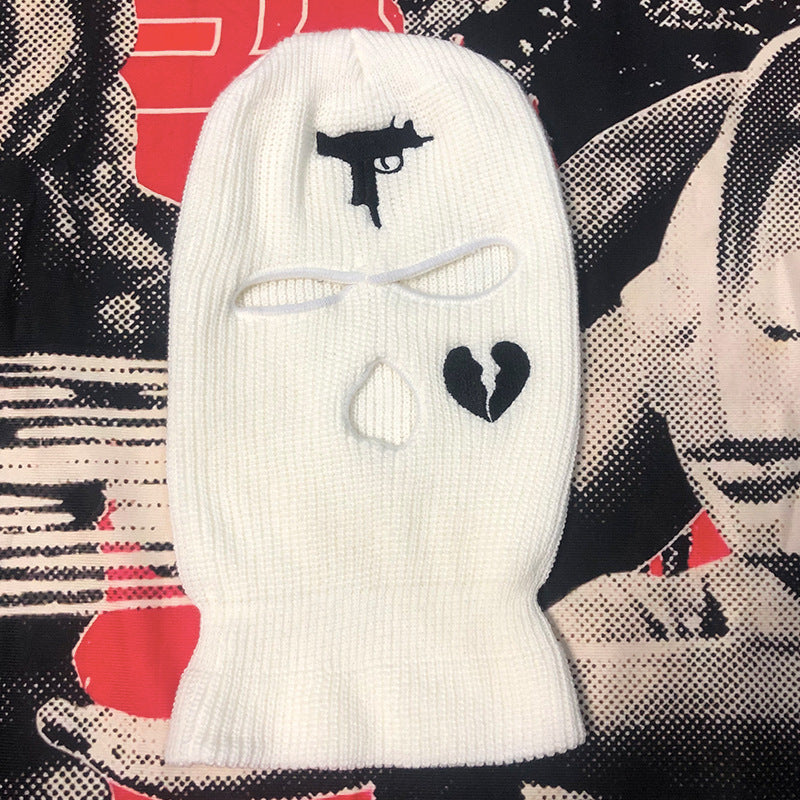 BLACK BALACLAVA WITH BROKEN HEART DETAILS AND GUN DESIGN