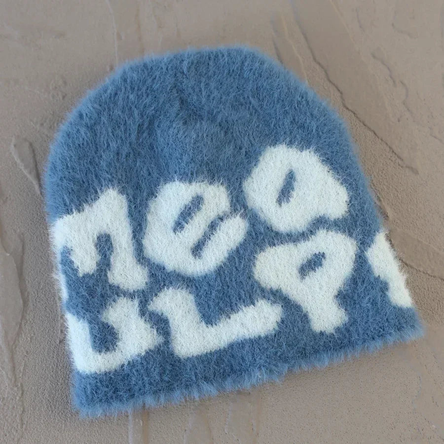 BLACK BEANIE WITH WHITE LETTERING - ROYAL BLUE SKY ACCENT