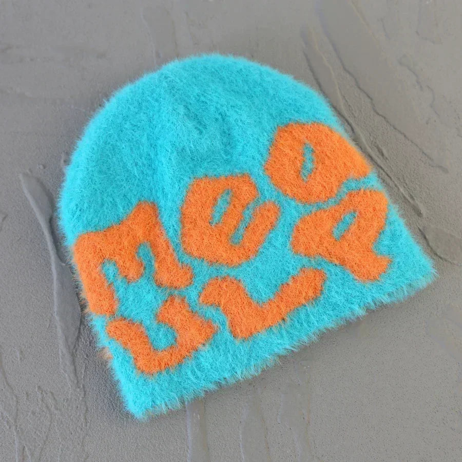 BLACK BEANIE WITH WHITE LETTERING - ROYAL BLUE SKY ACCENT