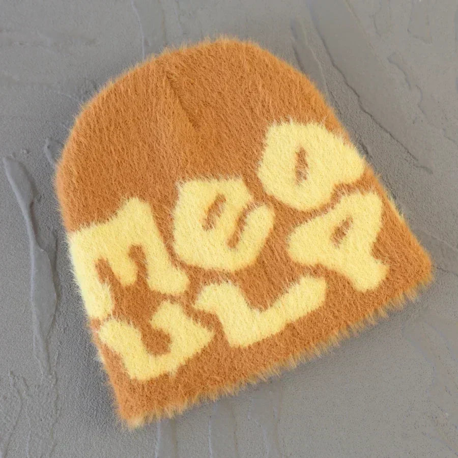 BLACK BEANIE WITH WHITE LETTERING - ROYAL BLUE SKY ACCENT