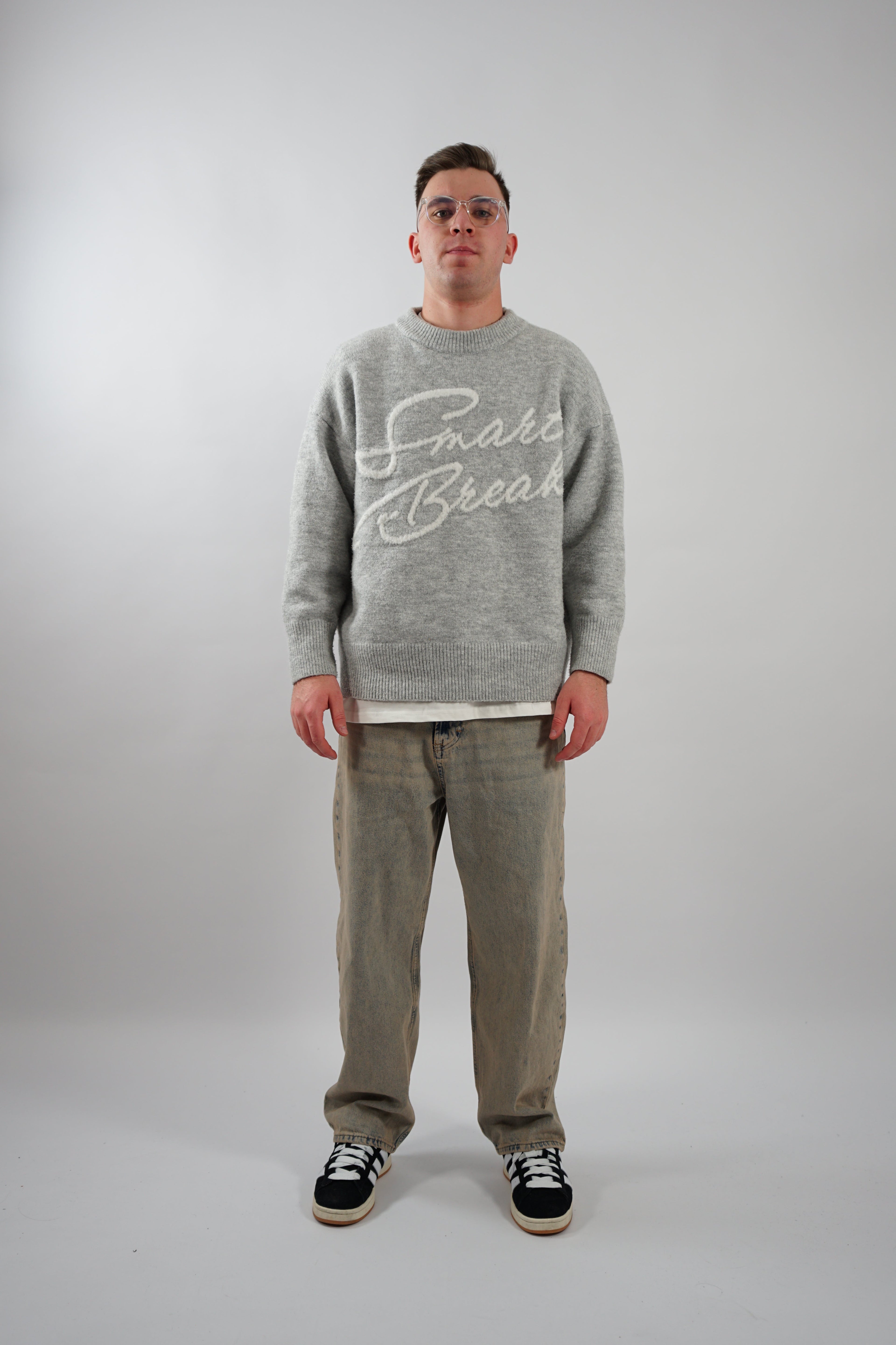 BLACK BREAK KNIT SWEATER WITH SMART BREAK TEXT