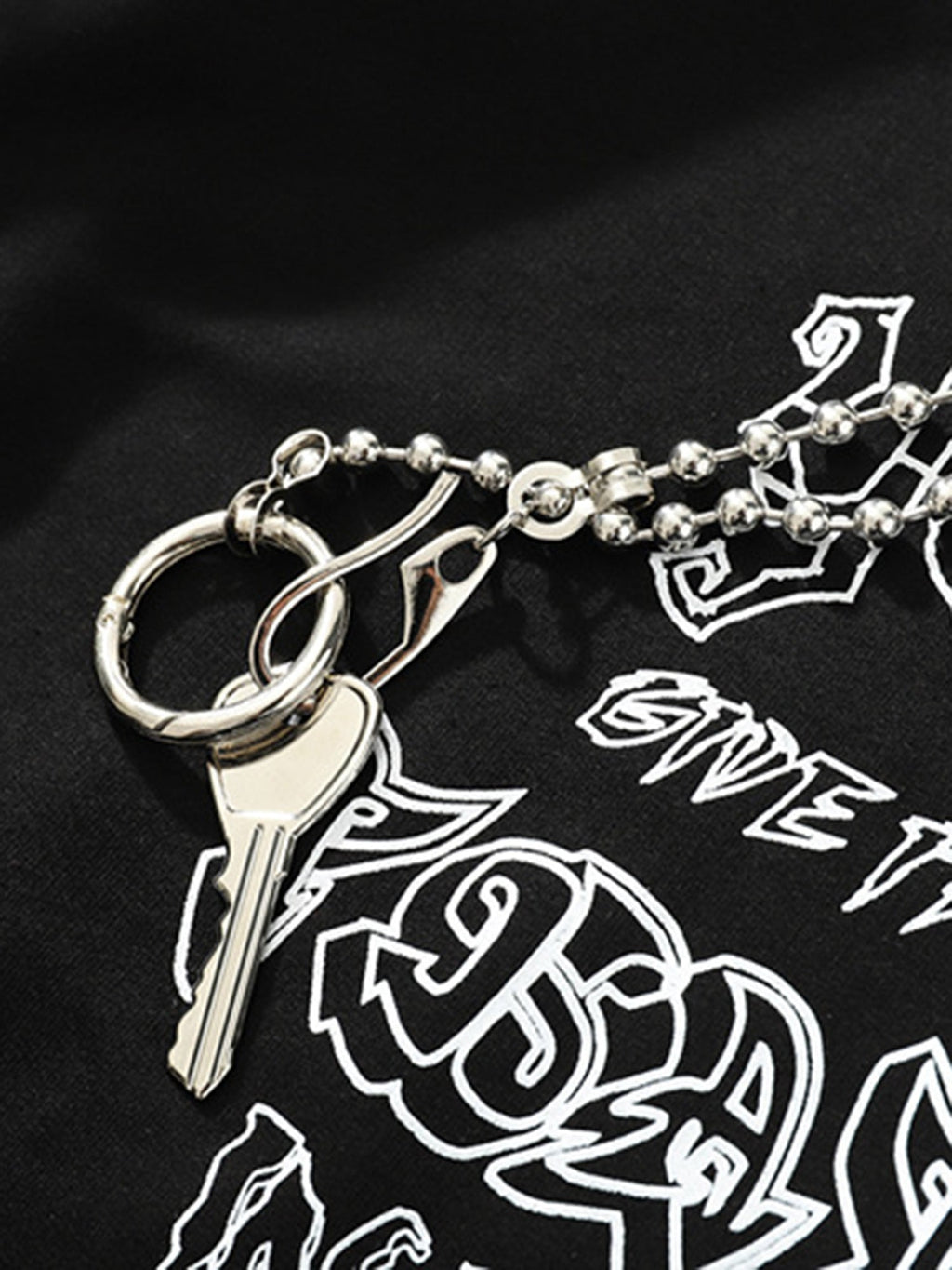 BLACK DISTRESSED SHORT SLEEVE T-SHIRT WITH ROUND COLLAR AND LOOSE FIT