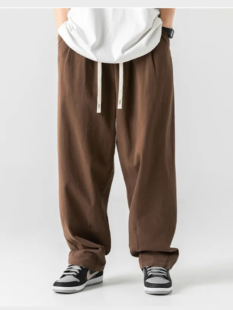 BLACK DRAWSTRING SWEATPANTS FOR MEN AND WOMEN COMFORT AND VERSATILITY