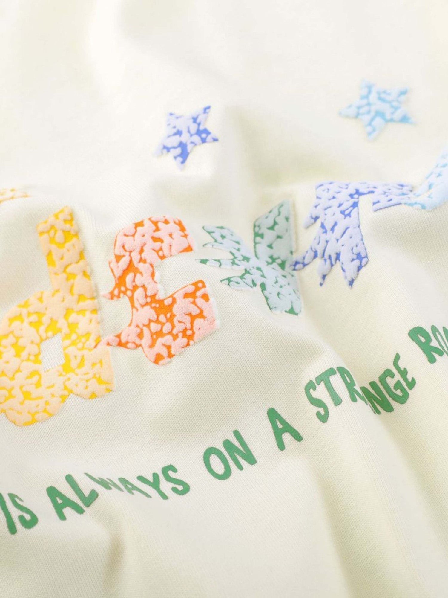 BLACK GRAPHIC T-SHIRT WITH STARS PRINTED DESIGN