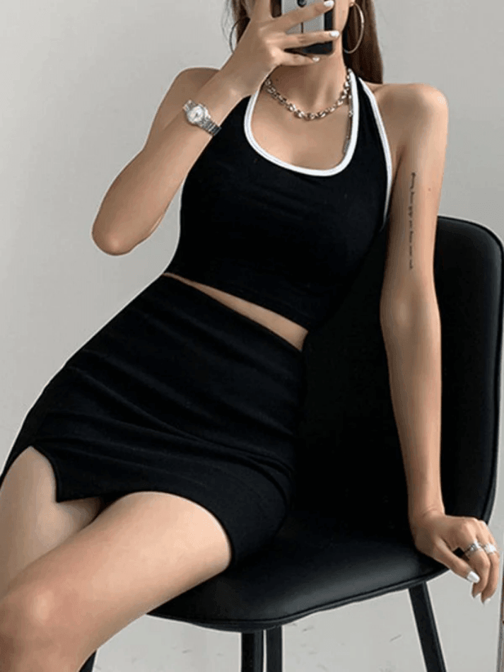 BLACK HALTER CROP TOP WITH CONTRAST COLOR PANEL - CHIC SPORTY STYLE