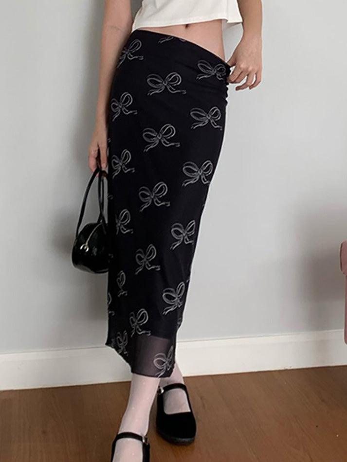 BLACK MIDI SKIRT WITH BOW PRINT - SLIM FIT DESIGN