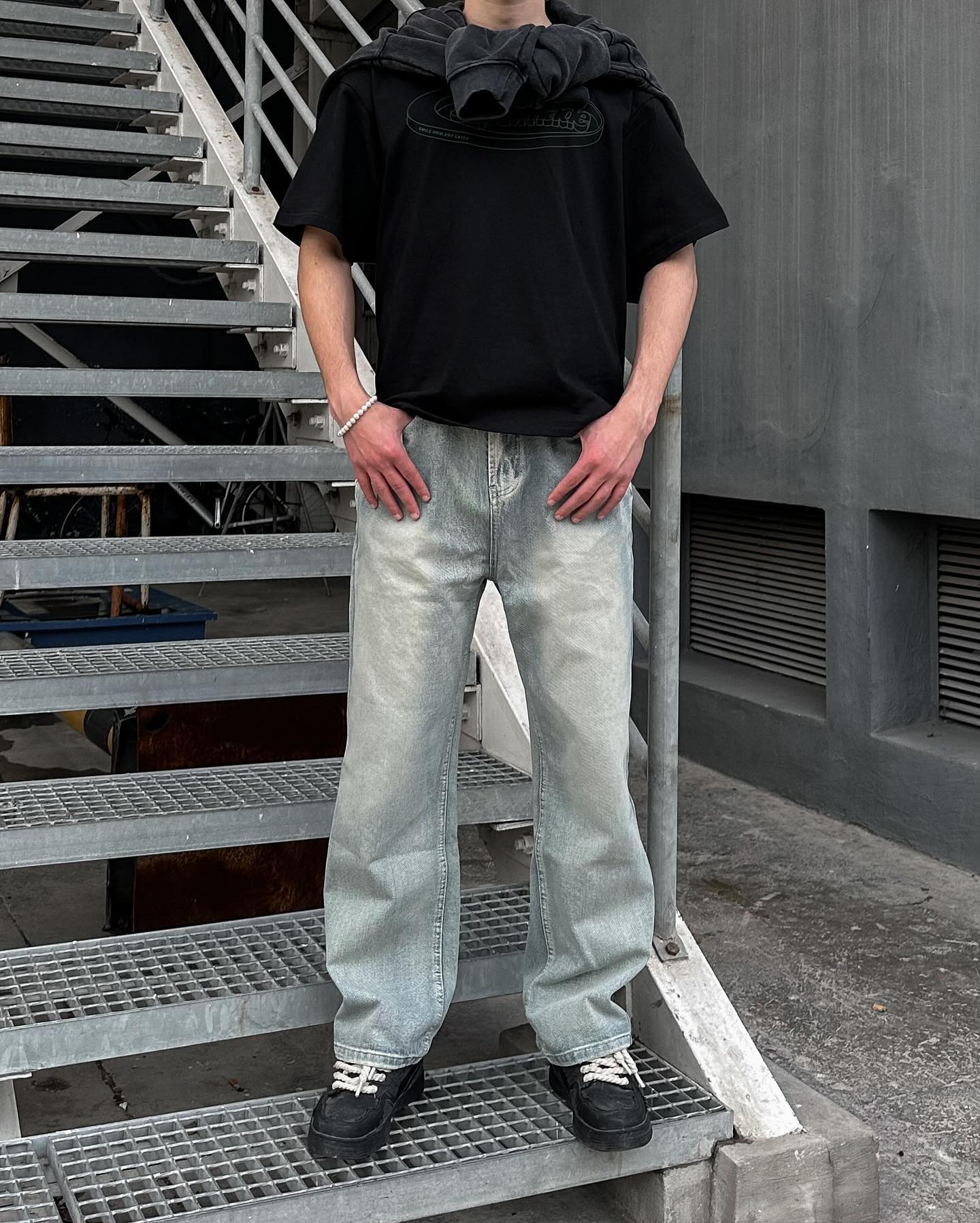 BLACK SHORT SLEEVE JERSEY WITH GREEN GRAPHIC DETAILS