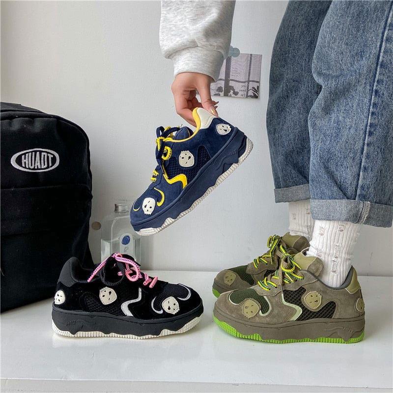 BLACK SNEAKERS WITH STRAWBERRY ACCENTS AND SUPERIOR TRACTION FIREBALL SHOES