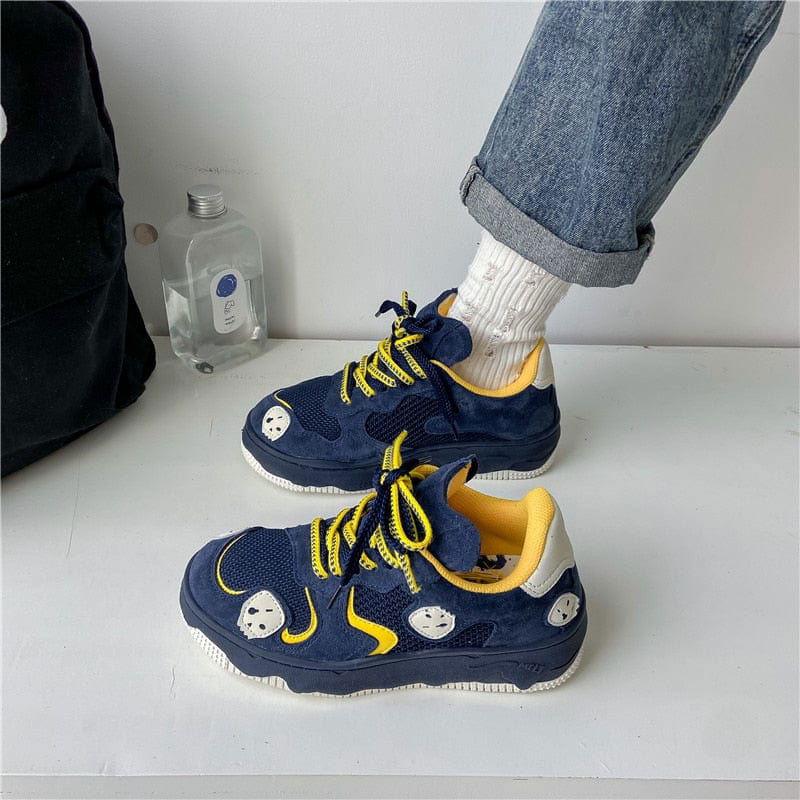 BLACK SNEAKERS WITH STRAWBERRY ACCENTS AND SUPERIOR TRACTION FIREBALL SHOES