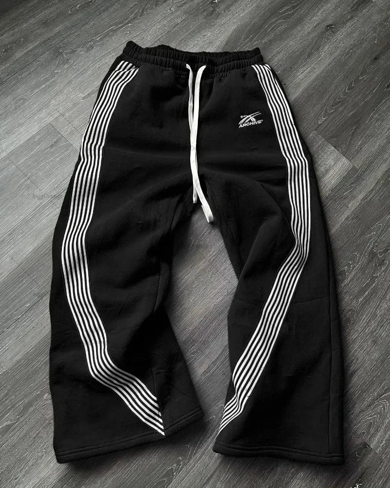 BLACK SWEATPANTS WITH WHITE STRIPES SECURE STORAGE SOLUTION
