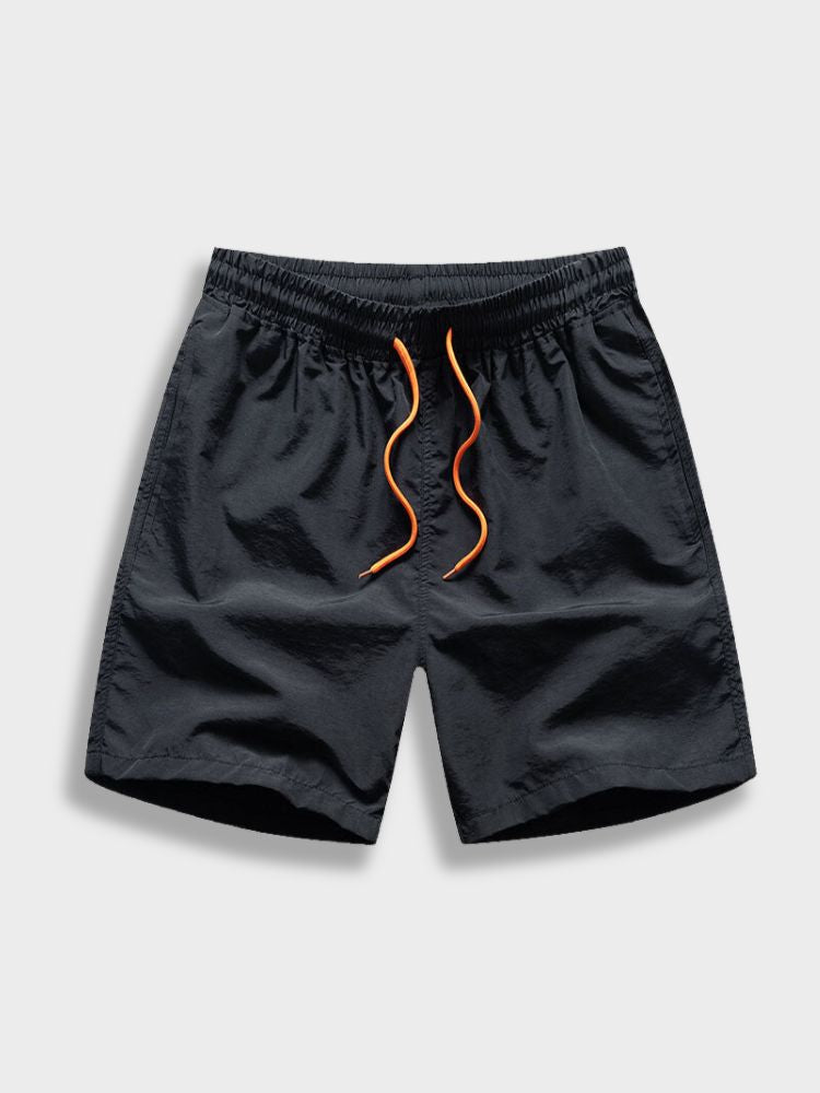BLACK SWIM TRUNKS WITH ORANGE DRAWSTRING