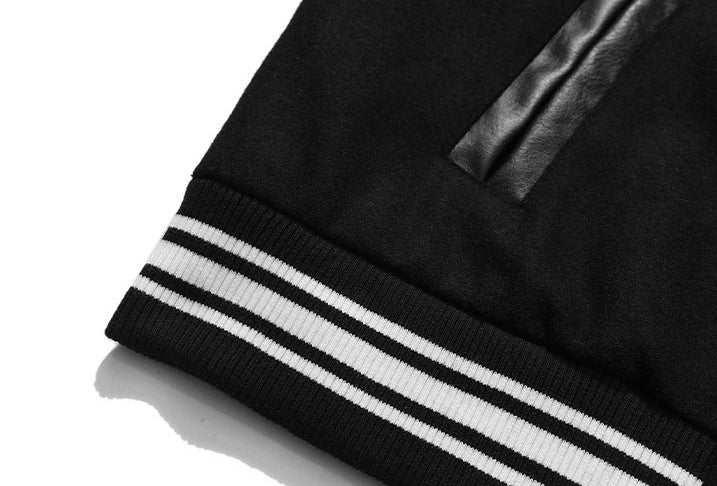 BLACK VARSITY JACKET WITH BONE SLEEVES CETTE VESTE EST CHIC