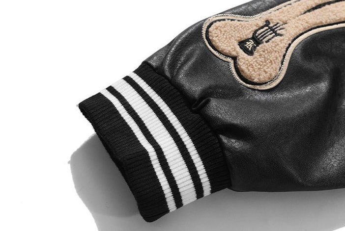 BLACK VARSITY JACKET WITH BONE SLEEVES CETTE VESTE EST CHIC