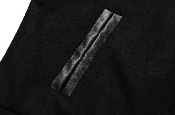 BLACK VARSITY JACKET WITH BONE SLEEVES CETTE VESTE EST CHIC