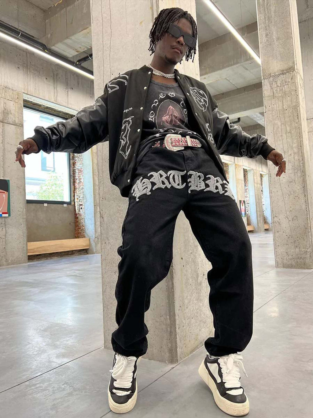 BLACK VARSITY JACKET WITH EMBROIDERED DESIGNS - SYMBOL EMBROIDERY