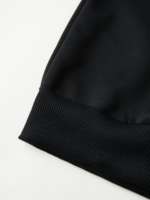 BLACK ZIP-UP HOODIE WITH STRIKING SKULL DESIGN