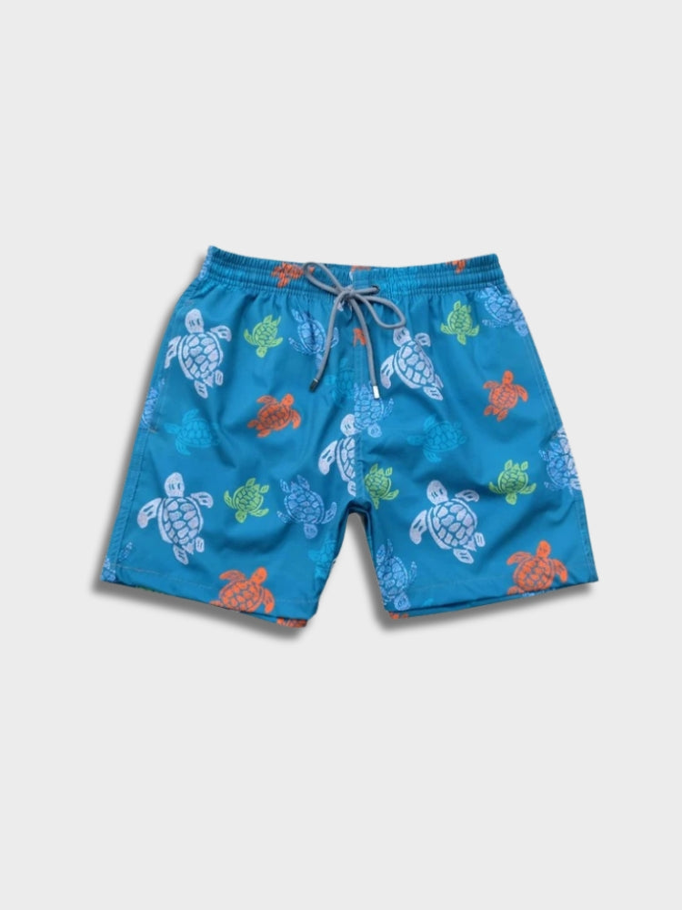 BLUE TURTLE-PATTERNED SWIM TRUNKS WITH COMFORTABLE UNISEX FIT
