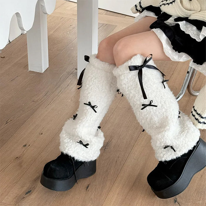 BROWN FUZZY LEG WARMERS WITH BLACK RIBBON ACCENTS