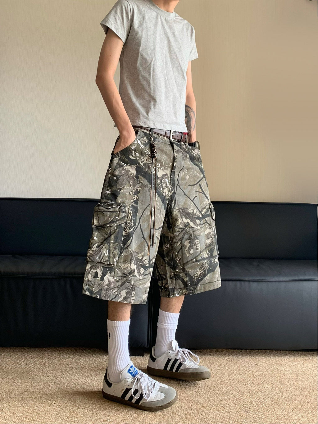 CAMOUFLAGE CARGO SHORTS WITH DESIGN ELEMENTS PRINT