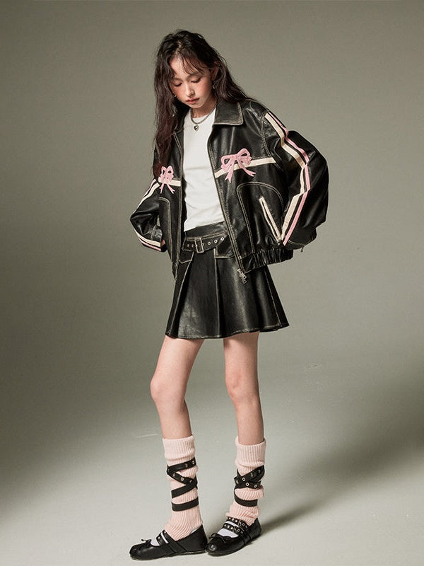 CHIC PLEATED MINI SKIRT IN BLACK FAUX LEATHER