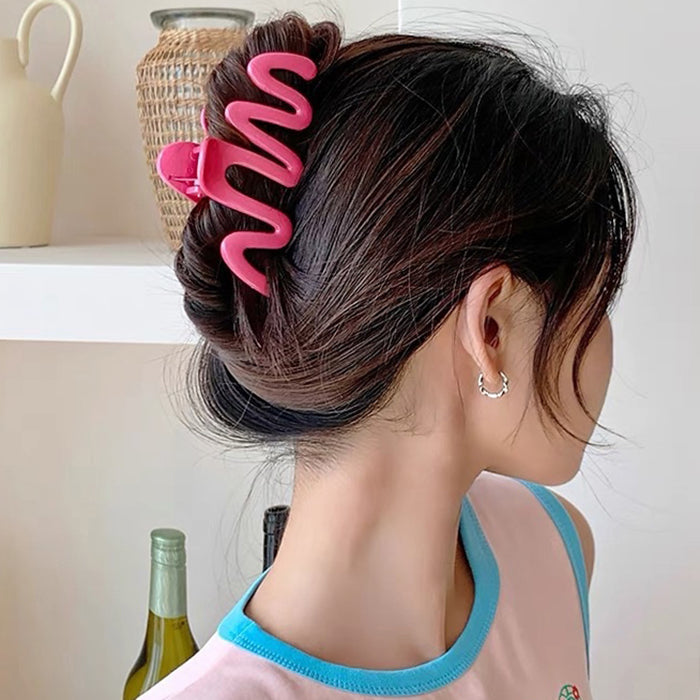 COLORFUL WAVE HAIR CLAW WITH GLOSSY PINK SQUIGGLE DESIGN