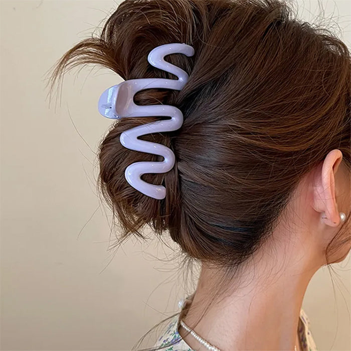 COLORFUL WAVE HAIR CLAW WITH GLOSSY PINK SQUIGGLE DESIGN