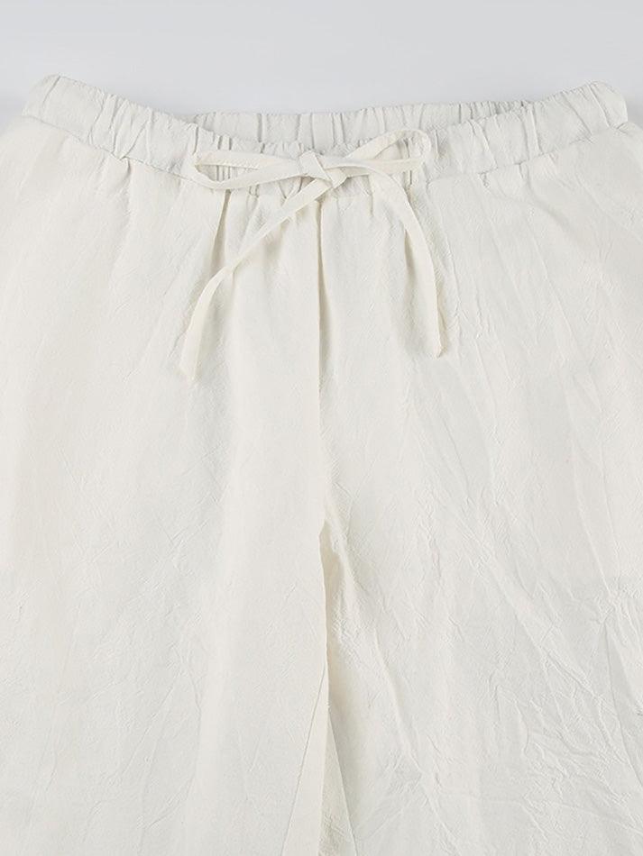 CREAM DRAWSTRING PANTS WITH SOFT STRETCH FABRIC FOR LOOSE FIT