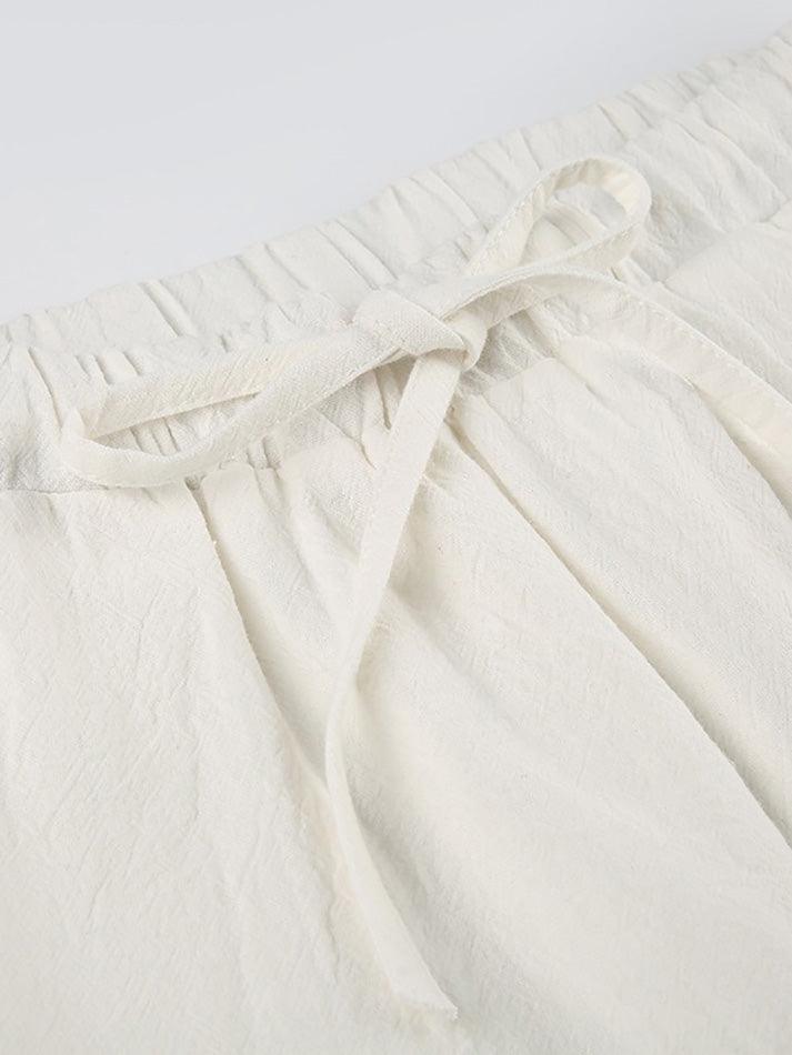 CREAM DRAWSTRING PANTS WITH SOFT STRETCH FABRIC FOR LOOSE FIT