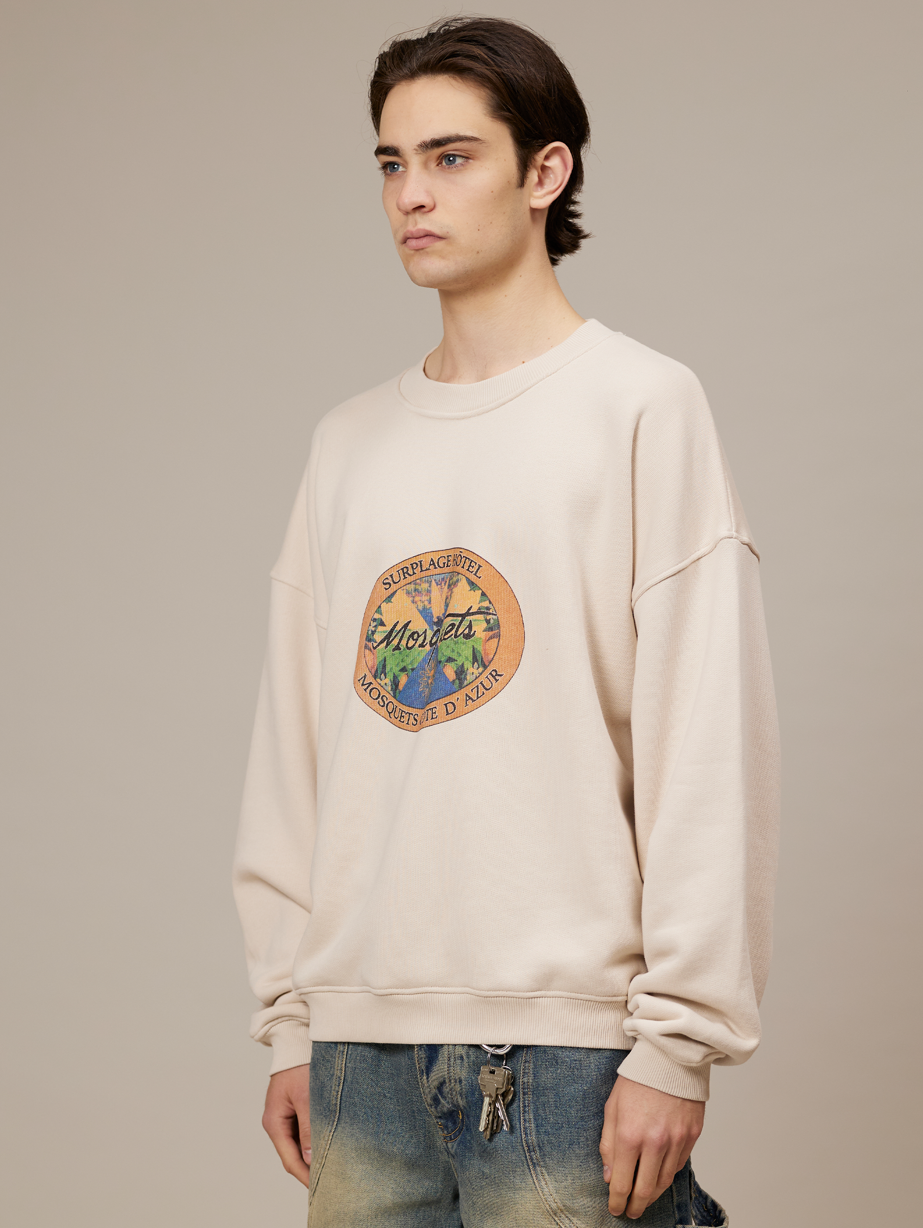 CREAM OVERSIZED SWEATSHIRT WITH OVAL GRAPHIC - ULTIMATE COMFORT
